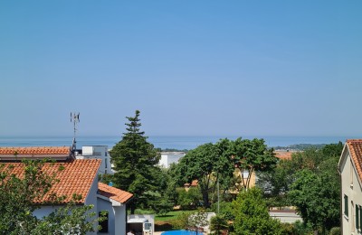 A wonderful new apartment with a roof terrace and a view of the sea